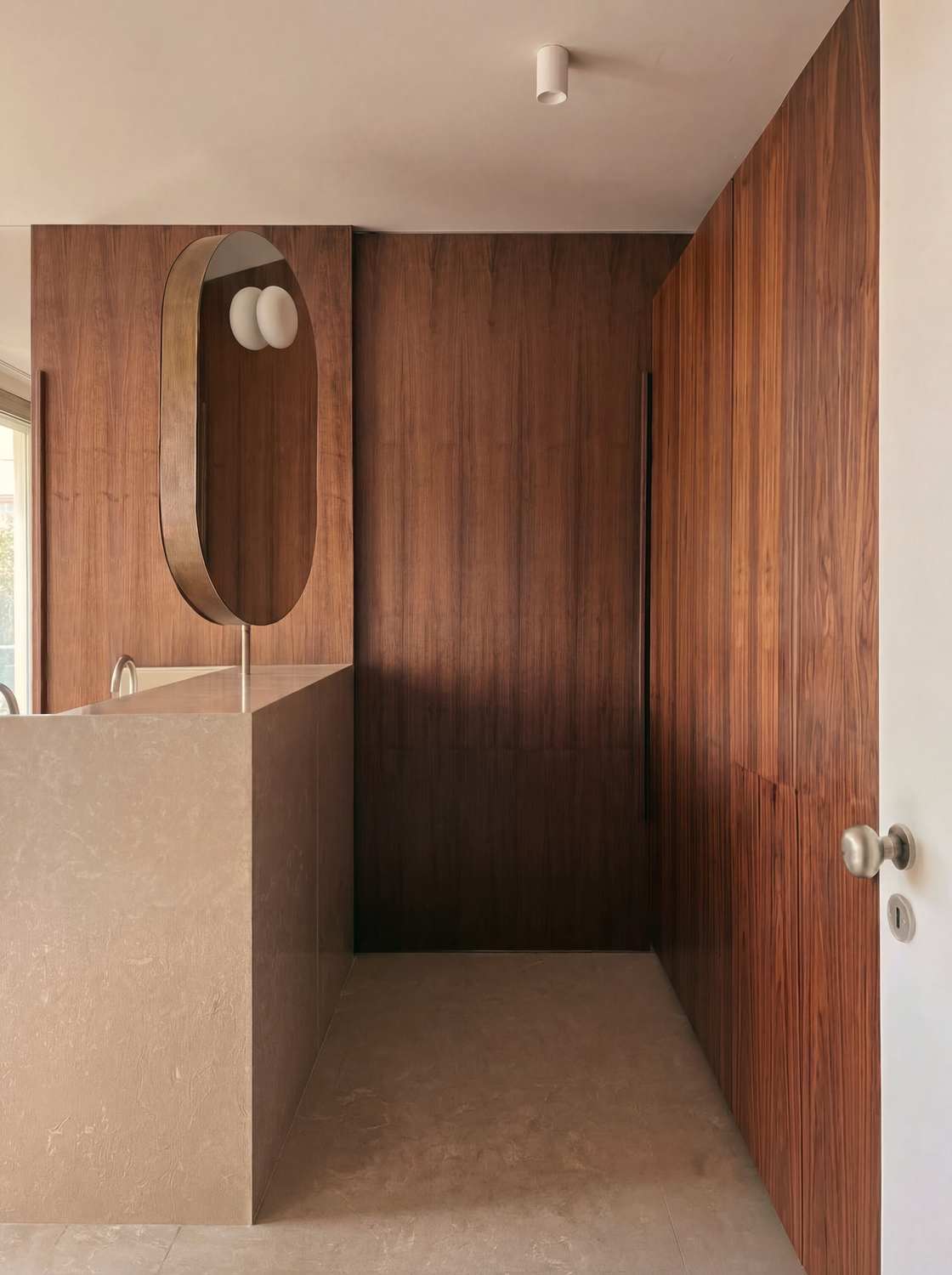photograph — bathroom in walnut and stone