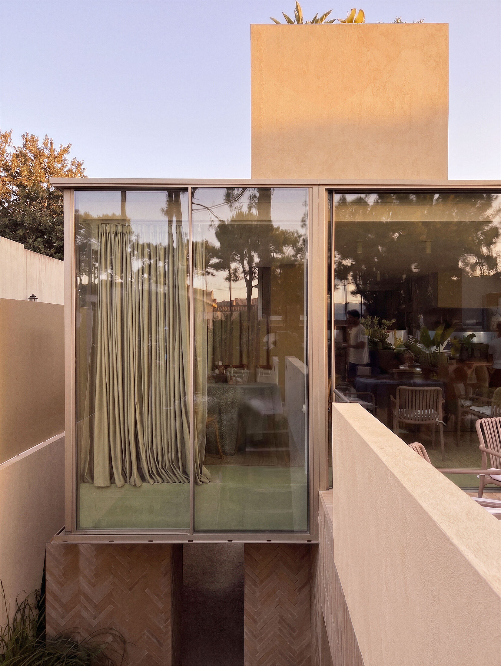 photograph — the glass room over the patio