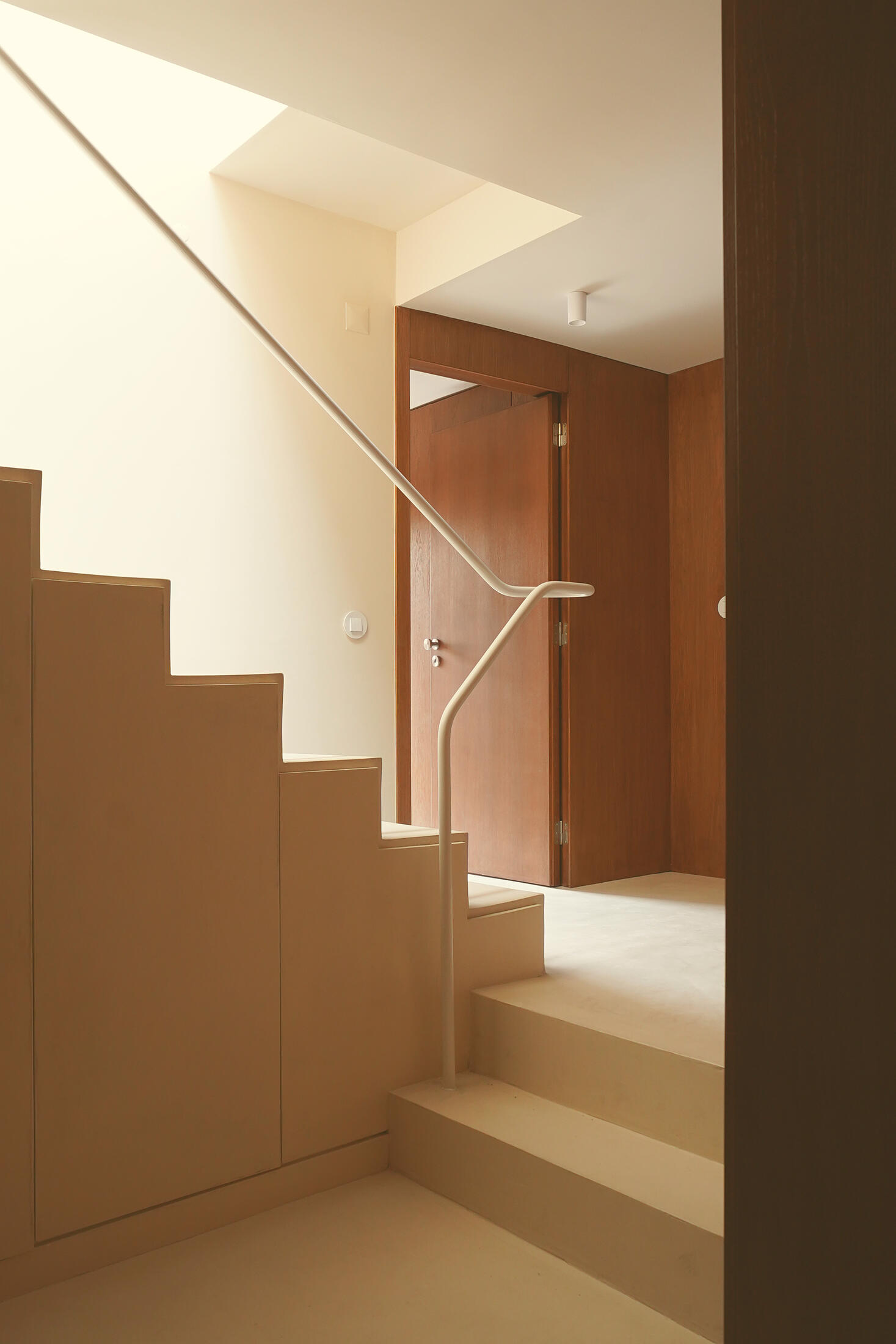 photograph — the stair meeting the oak hall