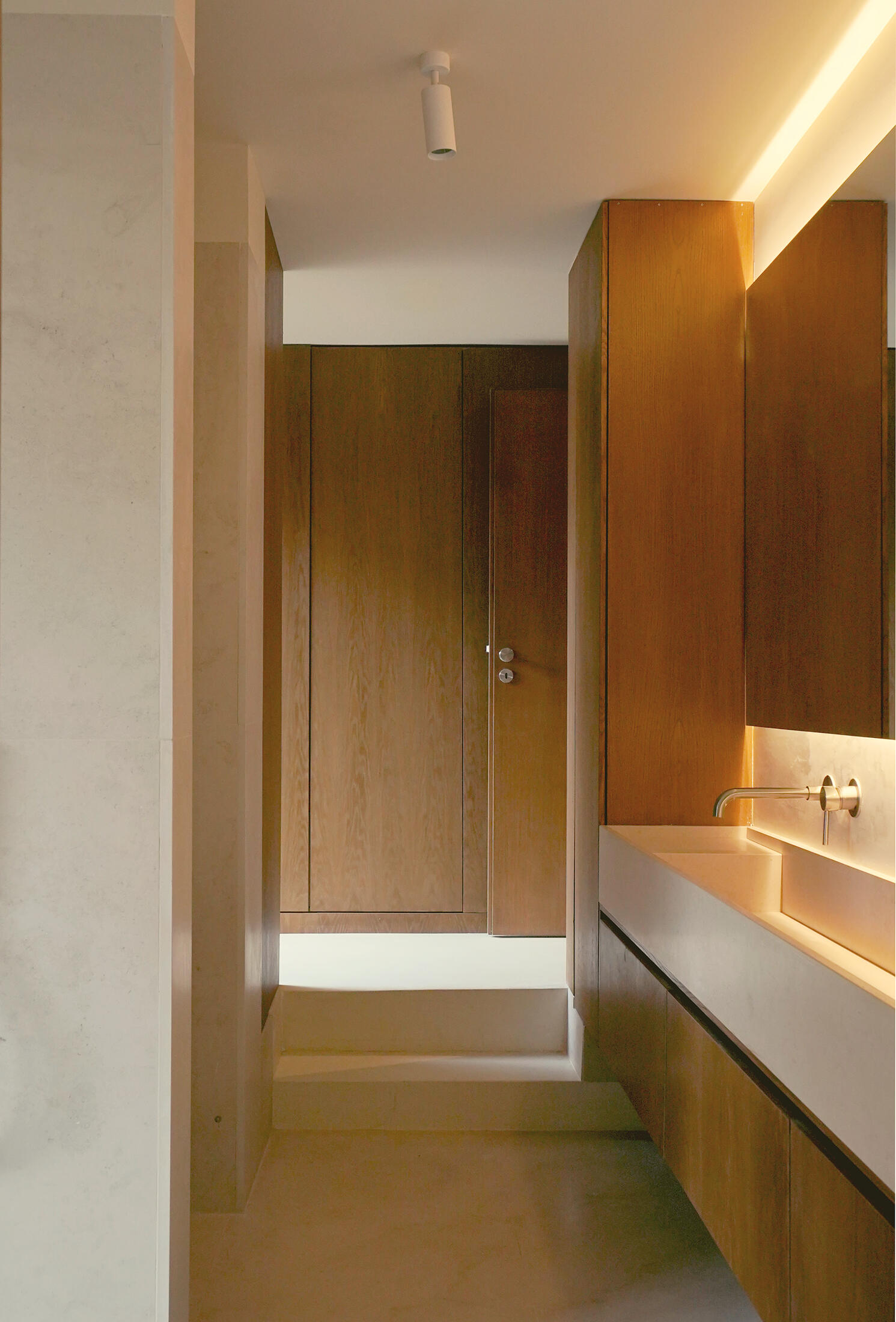 photograph — the vanity, lit from the wall