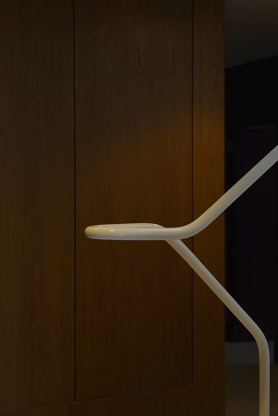 villa aroeira — the handrail against the walnut wall