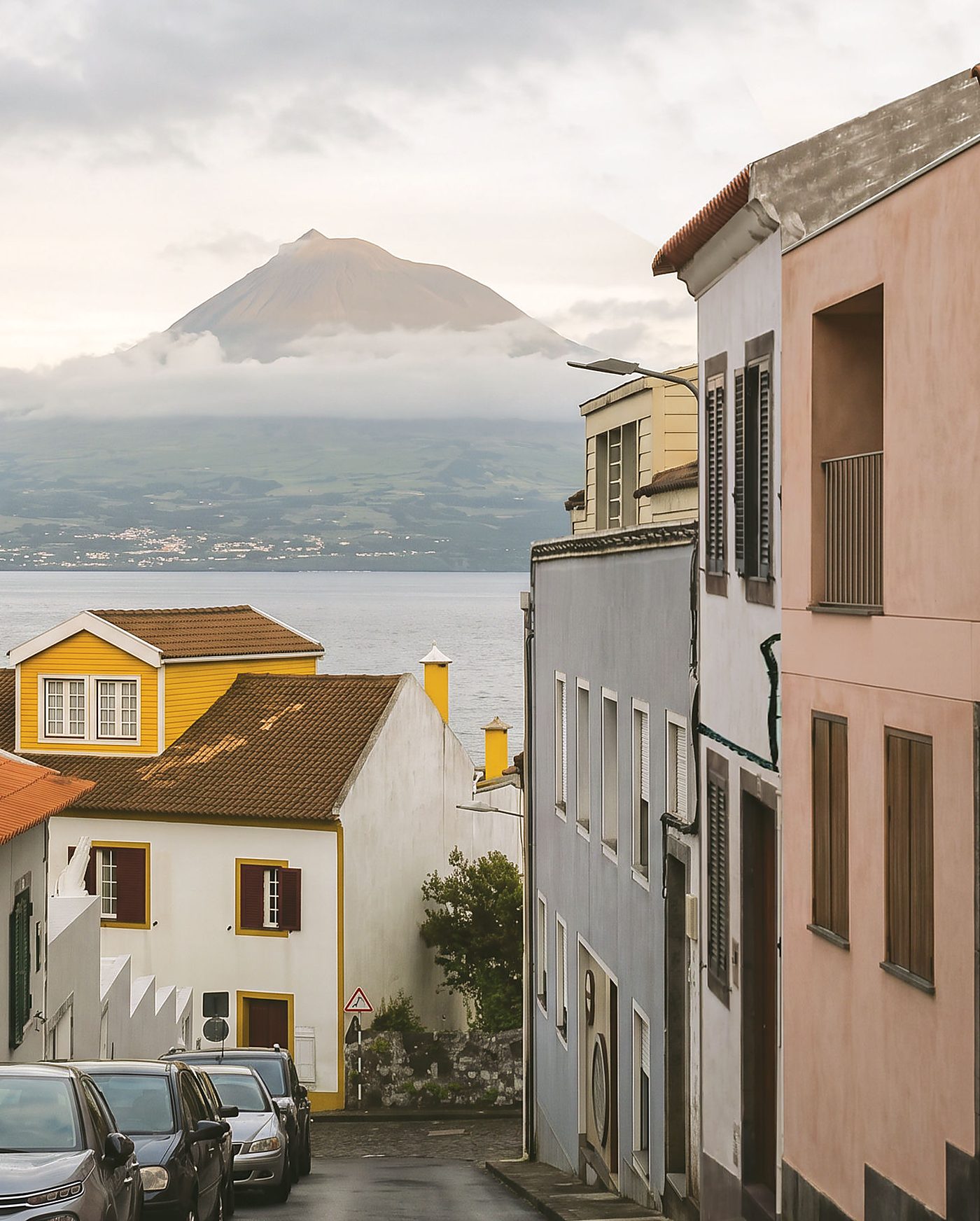 horta — the street descending to the channel, Pico across the water