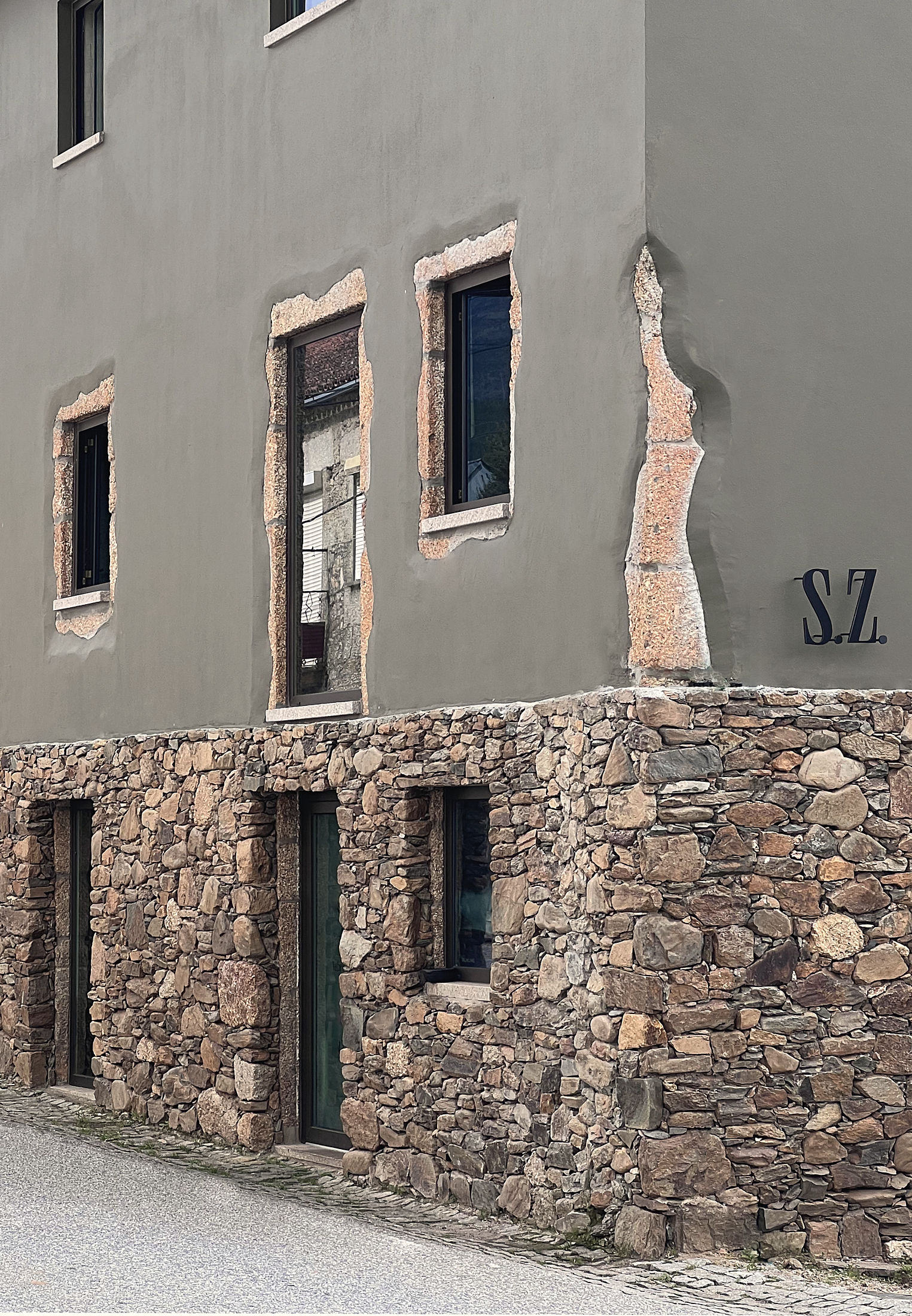 photograph — the verde seco front, granite left raw