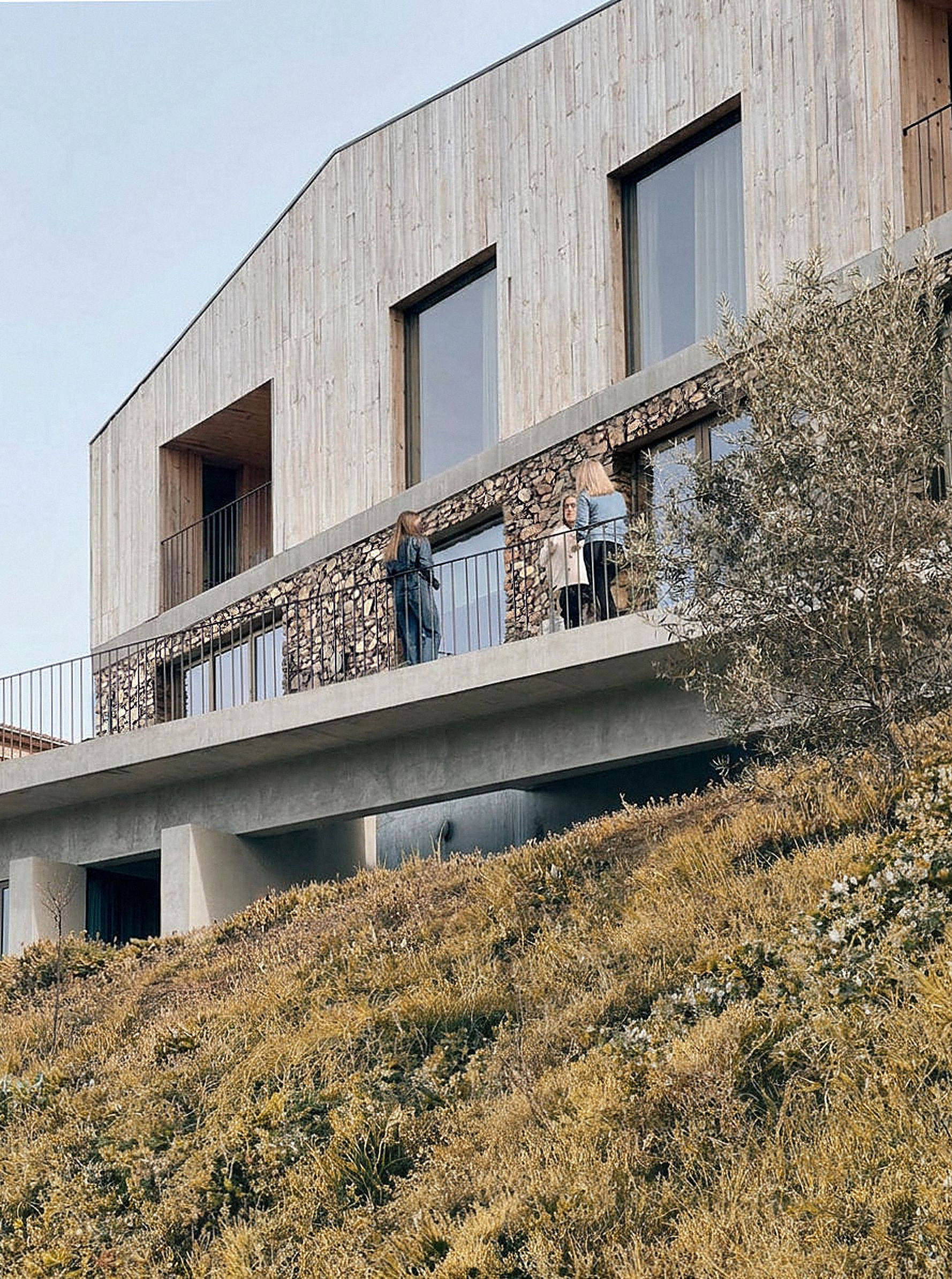photograph — guests on the long balcony