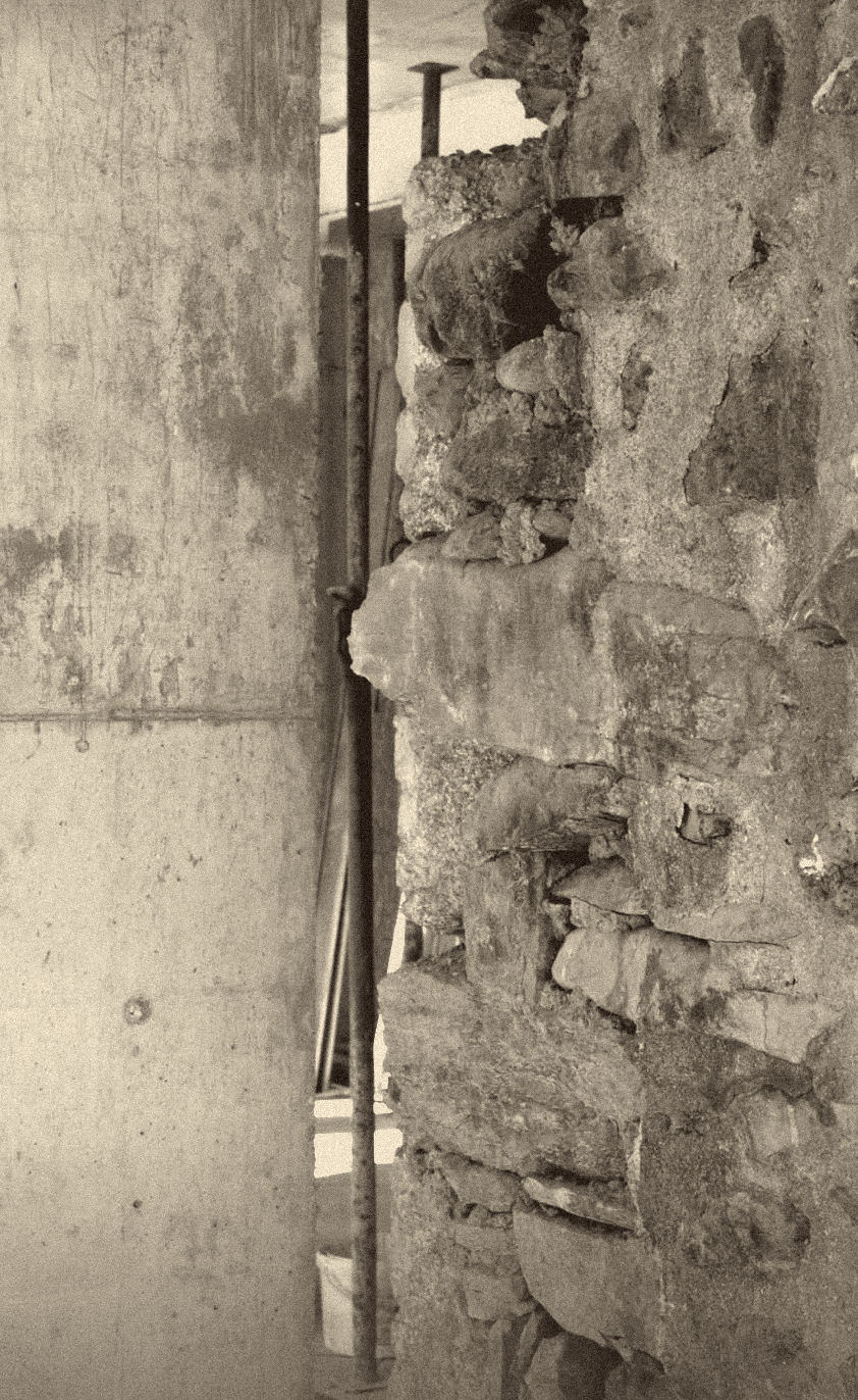 site photograph — old wall, new concrete