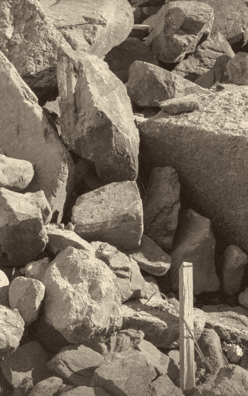 site photograph — the ruin, sorted into heaps