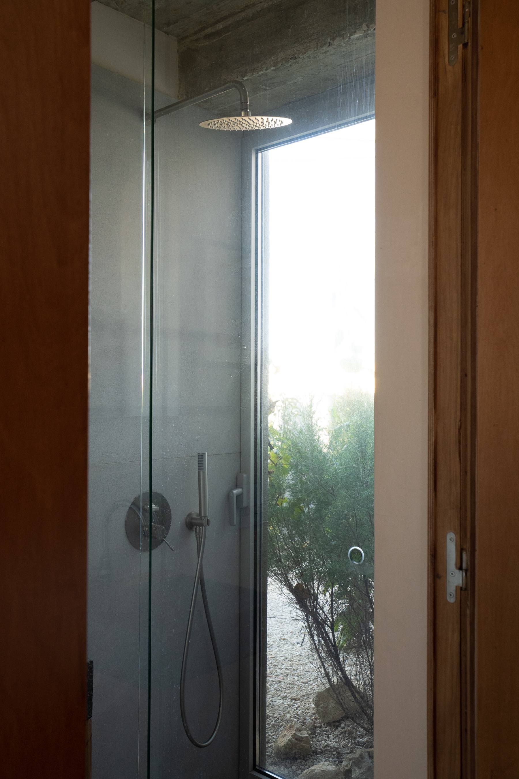 photograph — the shower, open to the garden
