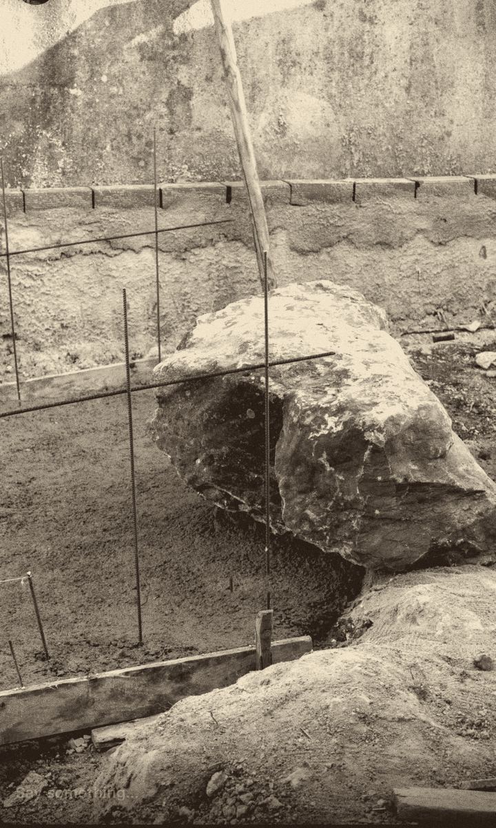site photograph — the boulder cast into the foundations · feb 2023